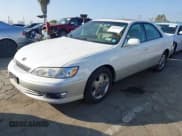 ✅ 2001 Lexus ES 300 • VIN: JT8BF28G010319810 • Lot: 43559533. Wystawiony na IAAI z przebiegiem 138 747 mil. Bezpłatny archiwum sprzedaży aukcyjnych z USA i szczegółowy raport historii pojazdu na DreamBid. Zdjęcie 2.