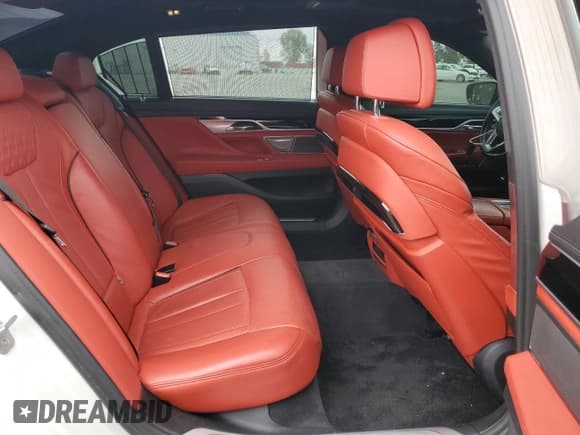 ✅ 2018 BMW 7 Series 750i • VIN: WBA7F0C53JGM24069 • Лот: 53515035. Опубликован ранее на Copart с пробегом 79 803 миль. Бесплатный доступ к архиву аукционных продаж из США и подробный отчёт об истории автомобиля на DreamBid. Изображение 10.