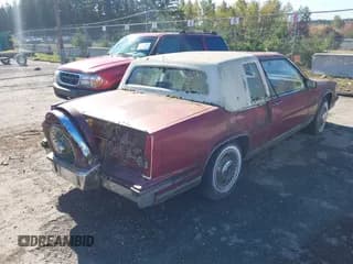 ✅ 1986 Cadillac DeVille • VIN: 1G6CD4787G4245050 • Lot: 43381875. Listed on IAAI with Not provided. Free auction sales archive from the USA and detailed vehicle history report at DreamBid. Image 4.