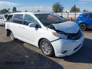 2011 Toyota Sienna XLE AAS with VIN 5TDYK3DC2BS050739, listed as a IAAI auction lot 43412295 with 215,195 mi miles and . Bid and sale history available at DreamBid. Image 1.