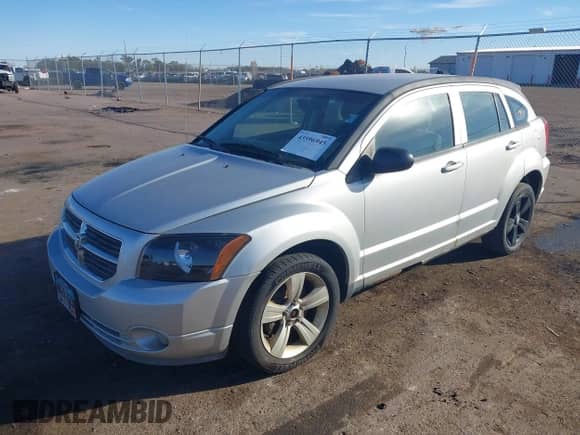 2012 Dodge Caliber SXT z VIN 1C3CDWDAXCD507920, wystawiony jako IAAI lot #43596945 z przebiegiem Nie podano mil oraz . Historia ofert i sprzedaży dostępna na DreamBid. Obrazek 2.