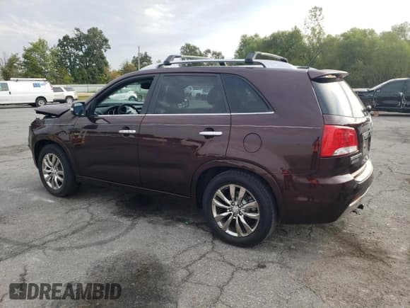 ✅ 2012 Kia Sorento SX • VIN: 5XYKW4A25CG243610 • Lot: 81154135. Wystawiony na Copart z przebiegiem 130 613 mil. Bezpłatny archiwum sprzedaży aukcyjnych z USA i szczegółowy raport historii pojazdu na DreamBid. Zdjęcie 2.