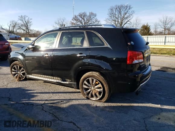 ✅ 2013 Kia Sorento SX • VIN: 5XYKW4A28DG357876 • Lot: 85158464. Listed on Copart with 208,094 mi. Free auction sales archive from the USA and detailed vehicle history report at DreamBid. Image 2.