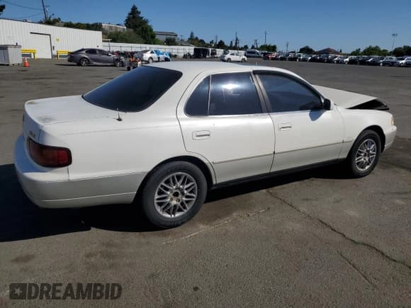 ✅ 1996 Toyota Camry LE • VIN: JT2BF12K3T0139807 • Lot: 57675855. Listed on Copart with 258,601 mi. Free auction sales archive from the USA and detailed vehicle history report at DreamBid. Image 3.