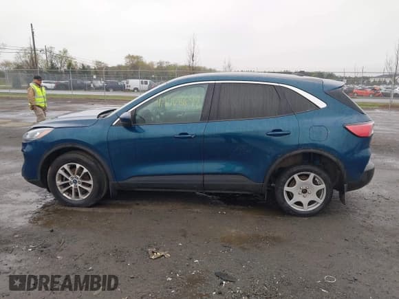 ✅ 2020 Ford Escape SE • VIN: 1FMCU9G60LUA89528 • Lot: 42008698. Listed on IAAI with 75,056 mi. Free auction sales archive from the USA and detailed vehicle history report at DreamBid. Image 14.