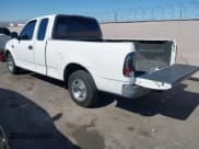 ✅ 2003 Ford F-150 XL • VIN: 1FTRX17W53NB22038 • Lot: 42630948. Listed on IAAI with 1,556,035 mi. Free auction sales archive from the USA and detailed vehicle history report at DreamBid. Image 3.