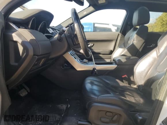 ✅ 2014 Land Rover Range Rover Evoque Pure Premium • VIN: SALVR2BG8EH893733 • Лот: 84881105. Опубликован ранее на Copart с пробегом 215 740 миль. Бесплатный доступ к архиву аукционных продаж из США и подробный отчёт об истории автомобиля на DreamBid. Изображение 7.