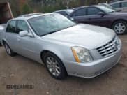 ✅ 2009 Cadillac DTS 1SA • VIN: 1G6KD57Y29U141277 • Lot: 41014185. Listed on IAAI with 164,622 mi. Free auction sales archive from the USA and detailed vehicle history report at DreamBid. Image 1.