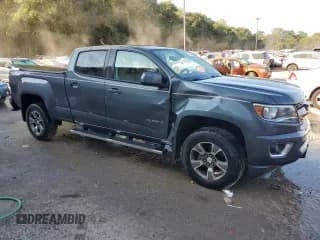 ✅ 2015 Chevrolet Colorado 4WD Z71 • VIN: 1GCGTCE32F1268285 • Лот: 70368764. Опубликован ранее на Copart с пробегом 38 911 миль. Бесплатный доступ к архиву аукционных продаж из США и подробный отчёт об истории автомобиля на DreamBid. Изображение 4.
