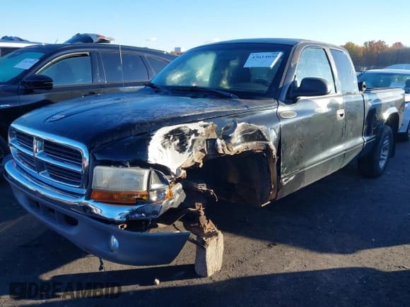 ✅ 2002 Dodge Dakota SLT • VIN: 1B7GL42N02S505517 • Lot: 43614055. Listed on IAAI with 94,752 mi. Free auction sales archive from the USA and detailed vehicle history report at DreamBid. Image 6.