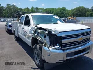 ✅ 2018 Chevrolet Silverado 2500HD Work Truck • VIN: 1GB1CUEGXJF197013 • Lot: 42231922. Listed on IAAI with 310,908 mi. Free auction sales archive from the USA and detailed vehicle history report at DreamBid. Image 1.