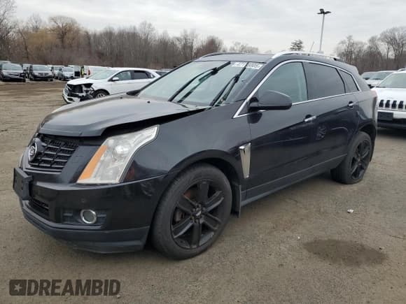 ✅ 2013 Cadillac SRX Performance Collection • VIN: 3GYFNHE37DS590591 • Lot: 47113005. Listed on Copart with 150,202 mi. Free auction sales archive from the USA and detailed vehicle history report at DreamBid. Image 1.