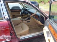 ✅ 1992 Jaguar XJ • VIN: SAJHY1743NC650202 • Lot: 42846970. Wystawiony na IAAI z przebiegiem 56 992 mil. Bezpłatny archiwum sprzedaży aukcyjnych z USA i szczegółowy raport historii pojazdu na DreamBid. Zdjęcie 5.