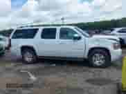 2014 Chevrolet Suburban LT z VIN 1GNSCJE07ER211222, wystawiony jako IAAI lot #42428084 z przebiegiem 214 712 mil mil oraz . Historia ofert i sprzedaży dostępna na DreamBid. Obrazek 6.