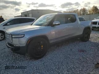 ✅ 2023 Rivian R1T Adventure • VIN: 7FCTGAAA2PN017170 • Lot: 77473014. Listed on Copart with 28,821 mi. Free auction sales archive from the USA and detailed vehicle history report at DreamBid. Image 1.