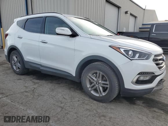 ✅ 2018 Hyundai Santa Fe 2.4L • VIN: 5XYZUDLB4JG536574 • Лот: 39175984. Опубликован ранее на Copart с пробегом 81 830 миль. Бесплатный доступ к архиву аукционных продаж из США и подробный отчёт об истории автомобиля на DreamBid. Изображение 4.