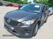 ✅ 2016 Mazda CX-5 Sport • VIN: JM3KE2BE0G0857015 • Lot: 42471734. Listed on IAAI with 81,401 mi. Free auction sales archive from the USA and detailed vehicle history report at DreamBid. Image 19.