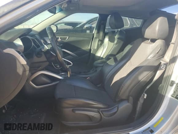 ✅ 2013 Hyundai Veloster w/Black Int • VIN: KMHTC6AD3DU157816 • Lot: 78554164. Wystawiony na Copart z przebiegiem 119 077 mil. Bezpłatny archiwum sprzedaży aukcyjnych z USA i szczegółowy raport historii pojazdu na DreamBid. Zdjęcie 7.