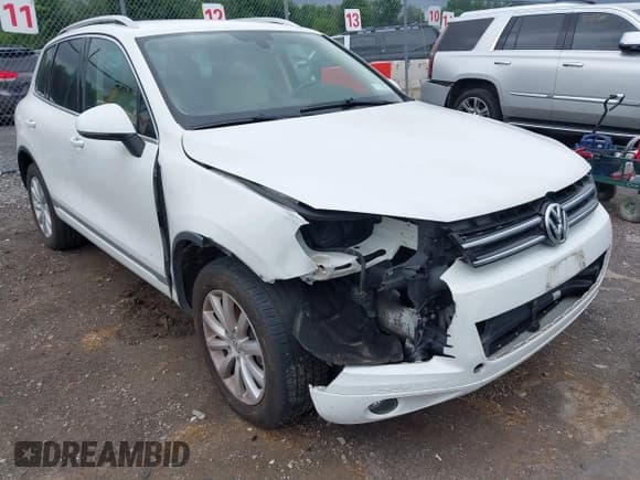 ✅ 2012 Volkswagen Touareg Lux • VIN: WVGEF9BP8CD008584 • Lot: 42675371. Wystawiony na IAAI z przebiegiem 129 477 mil. Bezpłatny archiwum sprzedaży aukcyjnych z USA i szczegółowy raport historii pojazdu na DreamBid. Zdjęcie 6.