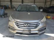 ✅ 2018 Hyundai Santa Fe 2.4L • VIN: 5NMZT3LB7JH085935 • Лот: 84585315. Опубликован ранее на Copart с пробегом 121 027 миль. Бесплатный доступ к архиву аукционных продаж из США и подробный отчёт об истории автомобиля на DreamBid. Изображение 5.