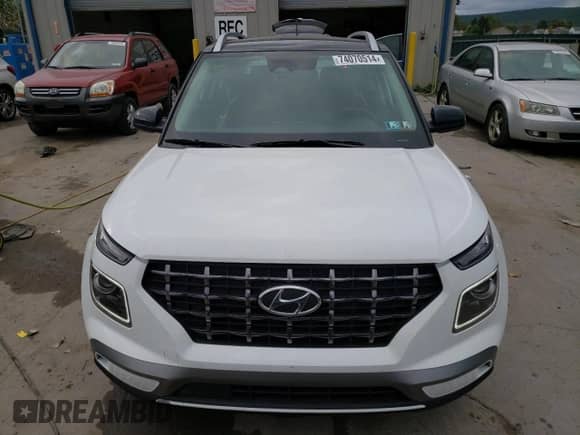 2024 Hyundai Venue SEL with VIN KMHRC8A37RU317460, listed as a Copart auction lot 74070514 with 6,817 mi miles and Salvage title. Bid and sale history available at DreamBid. Image 5.