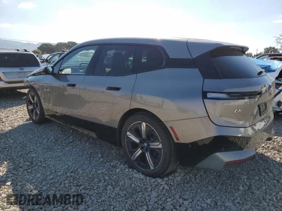 ✅ 2025 BMW iX xDrive50 • VIN: WB523CF09SCS15673 • Lot: 71554735. Listed on Copart with 11,593 mi. Free auction sales archive from the USA and detailed vehicle history report at DreamBid. Image 2.