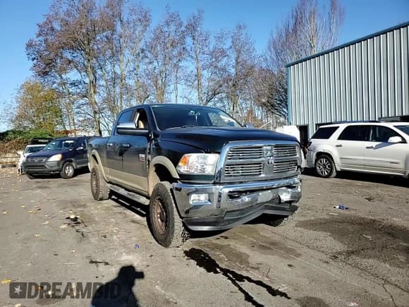 ✅ 2011 Ram 2500 Laramie • VIN: 3D7UT2CL9BG521913 • Lot: 84094124. Listed on Copart with 137,136 mi. Free auction sales archive from the USA and detailed vehicle history report at DreamBid. Image 11.