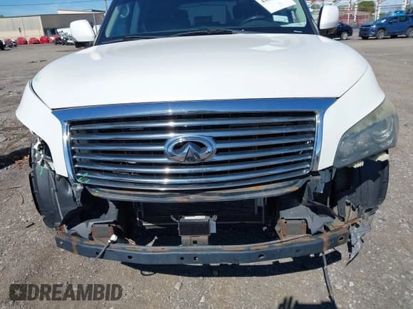 ✅ 2014 Infiniti QX80 • VIN: JN8AZ2NE9E9064040 • Lot: 43014644. Listed on IAAI with 141,766 mi. Free auction sales archive from the USA and detailed vehicle history report at DreamBid. Image 13.