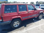 ✅ 1999 Jeep Cherokee Sport • VIN: 1J4FT68S8XL628417 • Lot: 42327461. Listed on IAAI with 229,605 mi. Free auction sales archive from the USA and detailed vehicle history report at DreamBid. Image 4.