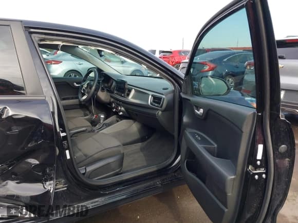 ✅ 2022 Kia Rio S • VIN: 3KPA24AD9NE462353 • Lot: 43239417. Listed on IAAI with 60,889 mi. Free auction sales archive from the USA and detailed vehicle history report at DreamBid. Image 5.