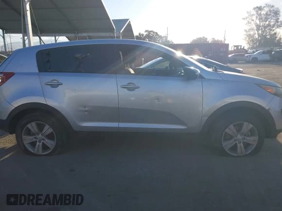✅ 2012 Kia Sportage LX • VIN: KNDPB3A22C7198862 • Lot: 43272092. Listed on IAAI with 146,674 mi. Free auction sales archive from the USA and detailed vehicle history report at DreamBid. Image 13.