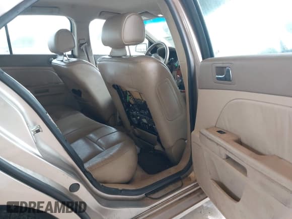 ✅ 2006 Cadillac STS • VIN: 1G6DW677560132141 • Lot: 42439166. Listed on IAAI with 116,496 mi. Free auction sales archive from the USA and detailed vehicle history report at DreamBid. Image 8.