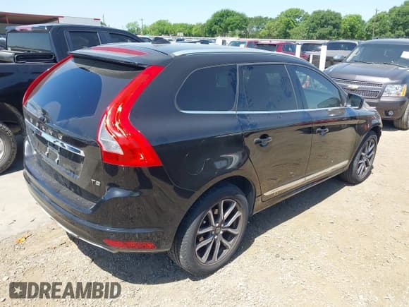 ✅ 2016 Volvo XC60 T5 Drive-E Premier • VIN: YV440MDK3G2899307 • Lot: 42003554. Listed on IAAI with 71,642 mi. Free auction sales archive from the USA and detailed vehicle history report at DreamBid. Image 4.