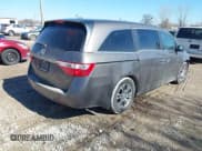 ✅ 2012 Honda Odyssey EX-L • VIN: 5FNRL5H61CB095761 • Lot: 41647368. Listed on IAAI with 146,661 mi. Free auction sales archive from the USA and detailed vehicle history report at DreamBid. Image 4.