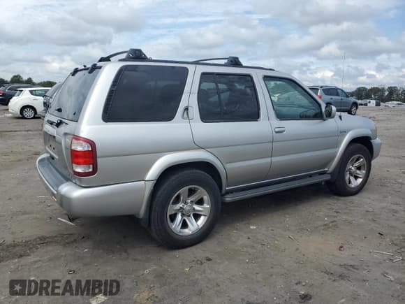 ✅ 2004 Nissan Pathfinder LE Platinum • VIN: JN8DR09Y44W917708 • Лот: 71596804. Опубликован ранее на Copart с пробегом Не указан. Бесплатный доступ к архиву аукционных продаж из США и подробный отчёт об истории автомобиля на DreamBid. Изображение 3.