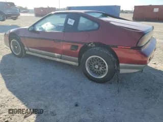 ✅ 1987 Pontiac Fiero GT • VIN: 1G2PG1195HP233666 • Lot: 78981714. Wystawiony na Copart z przebiegiem Nie podano. Bezpłatny archiwum sprzedaży aukcyjnych z USA i szczegółowy raport historii pojazdu na DreamBid. Zdjęcie 2.