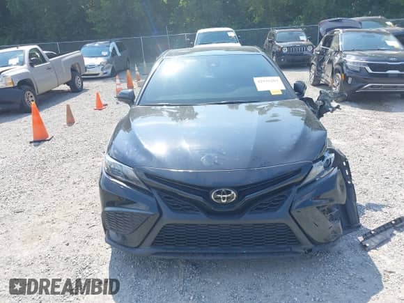 2022 Toyota Camry SE with VIN 4T1G11BK1NU053821, listed as a IAAI auction lot 42936203 with 41,547 mi miles and . Bid and sale history available at DreamBid. Image 12.