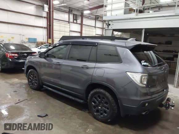 ✅ 2021 Honda Passport EX-L • VIN: 5FNYF8H50MB032907 • Lot: 43402303. Wystawiony na IAAI z przebiegiem 62 097 mil. Bezpłatny archiwum sprzedaży aukcyjnych z USA i szczegółowy raport historii pojazdu na DreamBid. Zdjęcie 3.