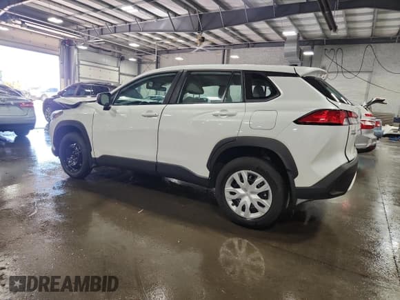 ✅ 2023 Toyota Corolla Cross L • VIN: 7MUAAABG6PV067152 • Lot: 84205805. Wystawiony na Copart z przebiegiem 32 953 mil. Bezpłatny archiwum sprzedaży aukcyjnych z USA i szczegółowy raport historii pojazdu na DreamBid. Zdjęcie 2.