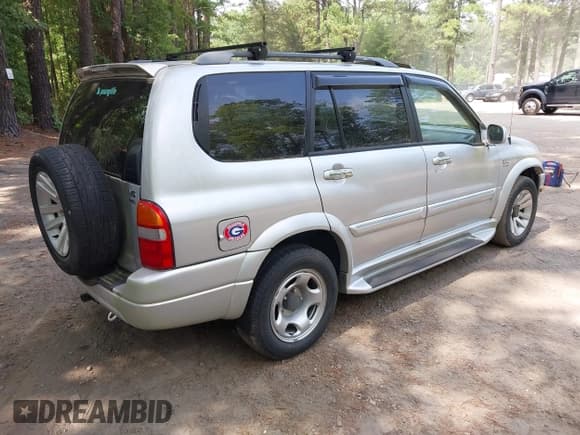✅ 2002 Suzuki XL7 Standard • VIN: JS3TX92V924105896 • Lot: 42869920. Listed on IAAI with 189,036 mi. Free auction sales archive from the USA and detailed vehicle history report at DreamBid. Image 4.