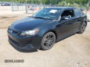 ✅ 2012 Scion tC • VIN: JTKJF5C72C3042514 • Lot: 42978299. Listed on IAAI with 77,956 mi. Free auction sales archive from the USA and detailed vehicle history report at DreamBid. Image 2.