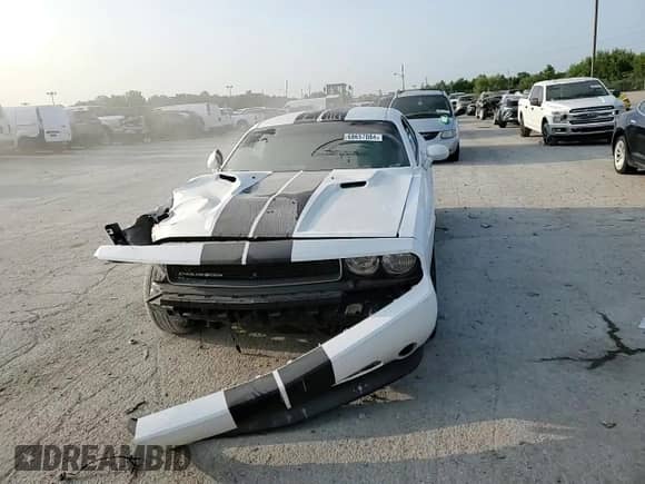 2013 Dodge Challenger SXT z VIN 2C3CDYAG8DH627871, wystawiony jako Copart lot #68657084 z przebiegiem Nie podano mil oraz Szkoda całkowita • Salvage title. Historia ofert i sprzedaży dostępna na DreamBid. Obrazek 10.