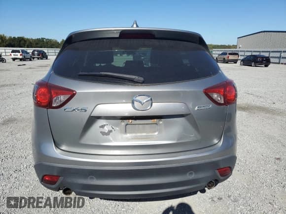 ✅ 2014 Mazda CX-5 Grand Touring • VIN: JM3KE2DY3E0365910 • Lot: 82513865. Listed on Copart with 122,834 mi. Free auction sales archive from the USA and detailed vehicle history report at DreamBid. Image 6.