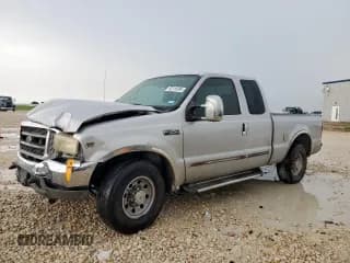 ✅ 2000 Ford F-350 • VIN: 1FTSX30S6YEB90151 • Lot: 63318395. Listed on Copart with 307,590 mi. Free auction sales archive from the USA and detailed vehicle history report at DreamBid. Image 1.