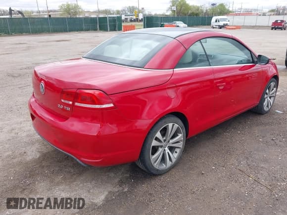 ✅ 2013 Volkswagen Eos Executive • VIN: WVWFW8AH5DV003044 • Lot: 41920847. Listed on IAAI with 114,566 mi. Free auction sales archive from the USA and detailed vehicle history report at DreamBid. Image 4.