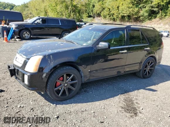 ✅ 2008 Cadillac SRX AWD • VIN: 1GYEE437080142958 • Lot: 71080485. Wystawiony na Copart z przebiegiem 185 346 mil. Bezpłatny archiwum sprzedaży aukcyjnych z USA i szczegółowy raport historii pojazdu na DreamBid. Zdjęcie 1.