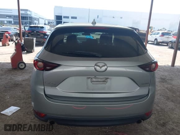 ✅ 2020 Mazda CX-5 Touring • VIN: JM3KFACM8L1770738 • Lot: 43237475. Wystawiony na IAAI z przebiegiem 96 169 mil. Bezpłatny archiwum sprzedaży aukcyjnych z USA i szczegółowy raport historii pojazdu na DreamBid. Zdjęcie 16.