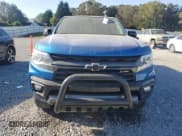 ✅ 2022 Chevrolet Colorado 4WD Z71 • VIN: 1GCGTDENXN1147977 • Лот: 75995264. Опубликован ранее на Copart с пробегом 26 184 миль. Бесплатный доступ к архиву аукционных продаж из США и подробный отчёт об истории автомобиля на DreamBid. Изображение 5.