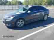 2014 Chevrolet Cruze 2LT with VIN 1G1PE5SB3E7269399, listed as a IAAI auction lot 43305556 with 139,689 mi miles and . Bid and sale history available at DreamBid. Image 2.