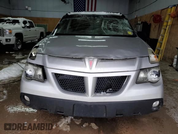 ✅ 2005 Pontiac Aztek • VIN: 3G7DB03E05S519440 • Lot: 82629564. Listed on Copart with 132,234 mi. Free auction sales archive from the USA and detailed vehicle history report at DreamBid. Image 5.